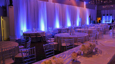Northridge Event Venue. purple up lit curtained wall