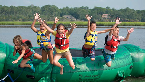 "Southern Living" Names HHI kids jumping off raft