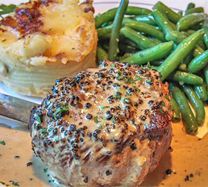 6 Places for Steak. a filet and green beans