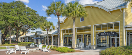 Tanger Outlets. Sponsor. A yellow building