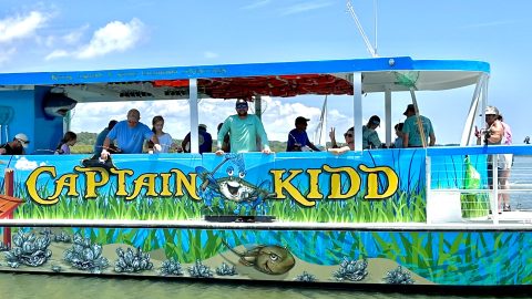 Colorful Captain Kidd boat on water