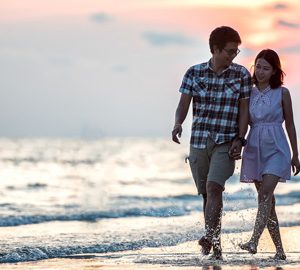 Valentine’s Day the Hilton Head Way. couple walking on the beach