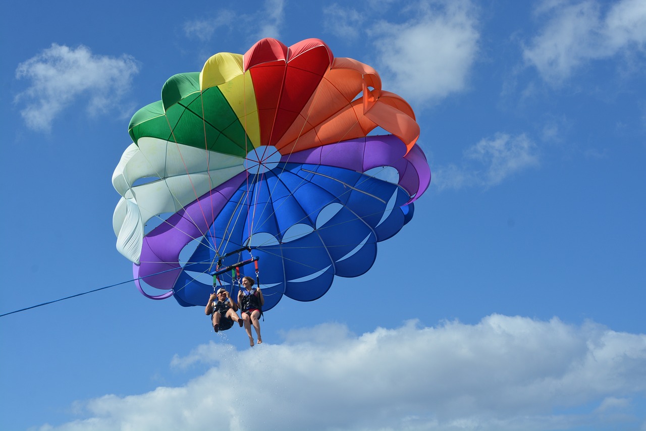 The High-Flying Joy of Parasailing. two people parasailing 