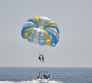 The High-Flying Joy of Parasailing. two people parasailing