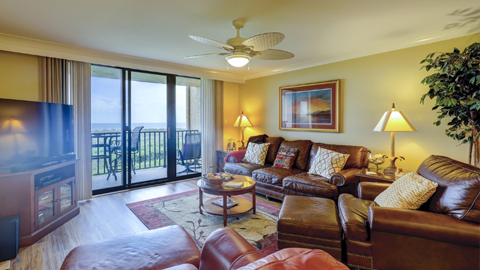 2202 Island Club. a tv room with ceiling fan