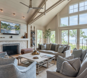 Hilton Head Exclusives. a tv room with vaulted ceilings