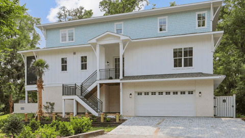 145 Shell Midden Lane a three story house with a 1950s design with garage
