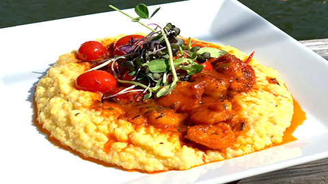 FISH. a plate of what looks like grits