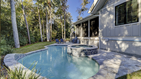 Epic Beach House. a back yard pool