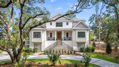 2 Midstream. a large white house with steps leading up to it