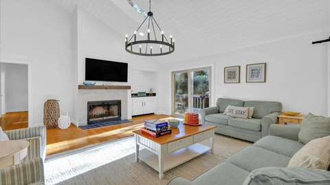 19 Dewberry Lane. A living room with a tv