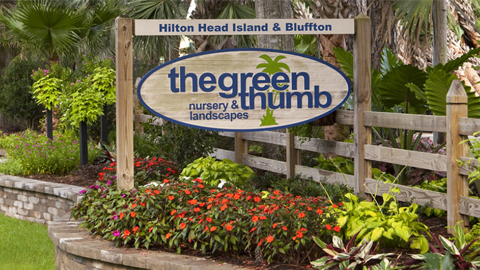 The Green Thumb. A sign that says The Green Thumb